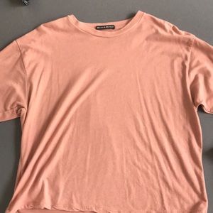 BRANDY MELVILLE peach colored t-shirt